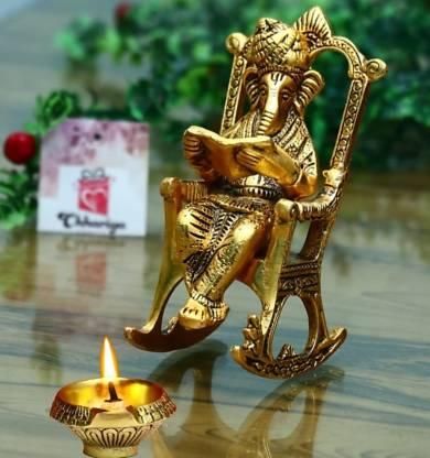Golden Lord Ganesha Statue Reading Ramayan Showpiece