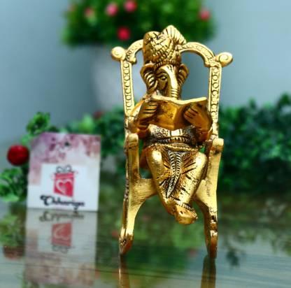 Golden Lord Ganesha Statue Reading Ramayan Showpiece